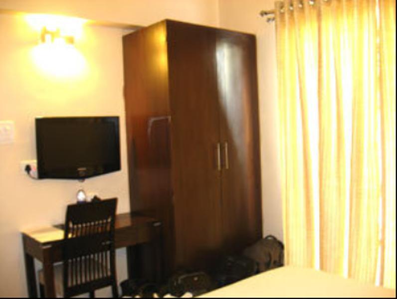 Hotel The Elite Suites Pune Room photo