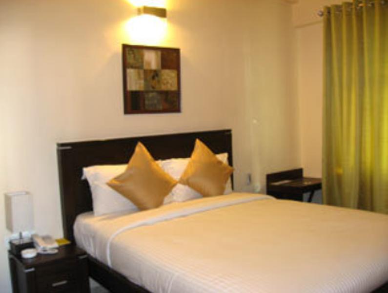 Hotel The Elite Suites Pune Room photo