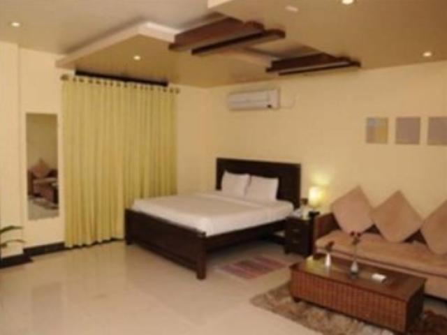 Hotel The Elite Suites Pune Room photo